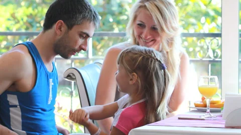 Family having breakfast in kitchen Video stock 34218045