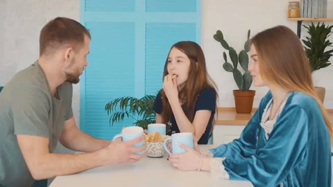 Family Having Breakfast in the Kitchen Stock Footage 105931444