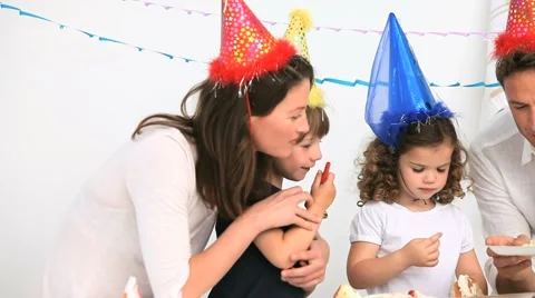 Family having fun during a birthday party Stock Footage