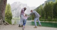 A Family On A Holiday Having Fun And Playing All Together In The Mountains. Stock Footage