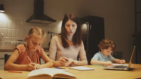 Family Homework Study Time in Kitchen Stock Footage 267601281
