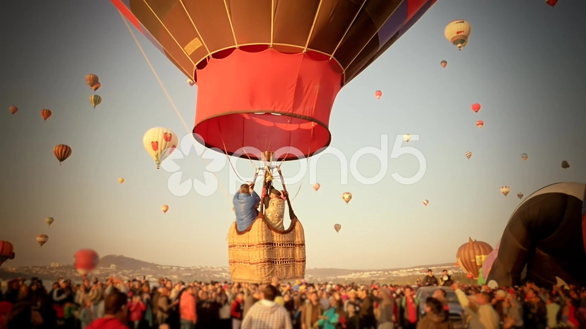 Family on hot air balloon departing | Stock Video | Pond5