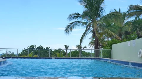 Family jumping into pool Stock Footage 57171444