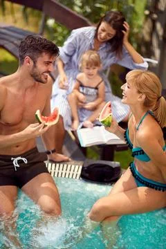 Family with kid and babysitter having fun Stock Photos