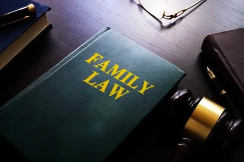 Family law on a table. Child custody and divorce concept. Stock Photos