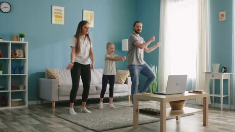 Family Is Learning Dance Using Laptop Stock Footage 135445103