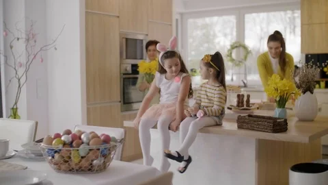 Family make preparations for easter breakfast Stock Footage 86419288