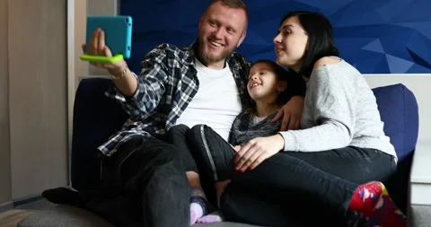 Family makes virtual visit to relatives during video call by tablet Stock Footage 151005283