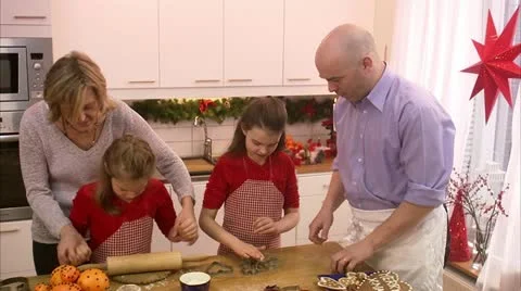 A family making gingerbread biscuits Stock Footage 11332516