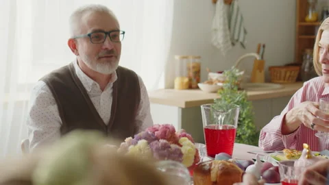 Family Members Speaking on Easter Dinner Stock Footage 224555864