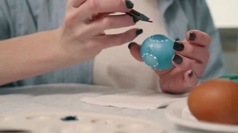 The family is painting Easter eggs. Video stock 147452385