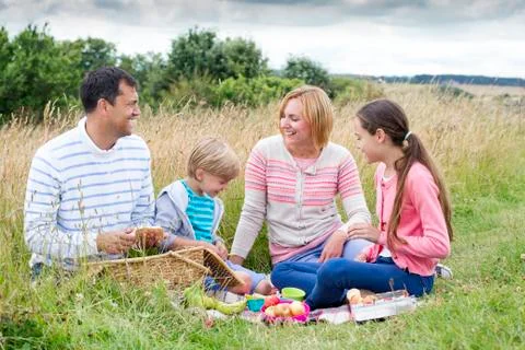 Family picnic at the beach Stock Photos