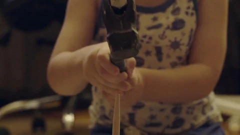 Family playing in the archeology destroys the plaster to get the skeleton Stock Footage