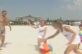 Family playing with ball on beach Footage
