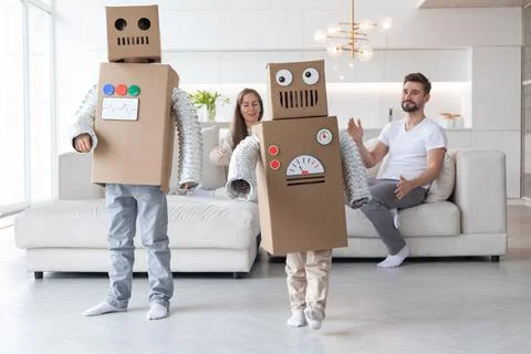 Family playing robots at home Stock Photos