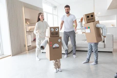 Family playing robots at home Stock Photos
