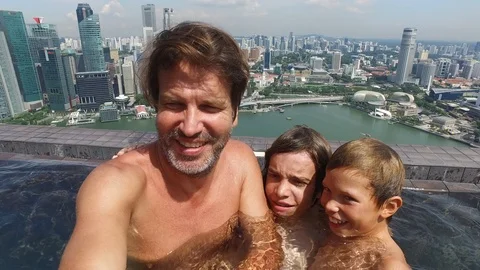 Family in a pool Stock Footage 102052237