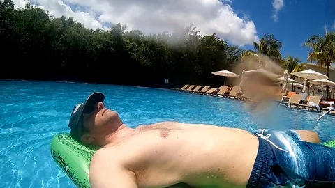 Family in pool Stock Footage 107823658