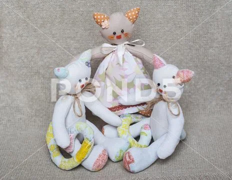 Family portrait of toy cats Stock Photos
