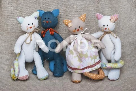 Family portrait of toy cats Stock Photos