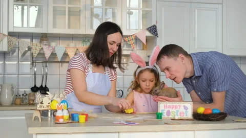 Family Preparing for Easter with Cute Rabbit Stock Footage 147443724