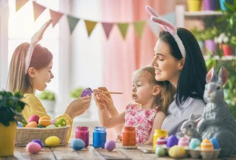 Family preparing for Easter Stock Photos