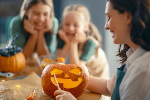 Family preparing for Halloween Stock Photos