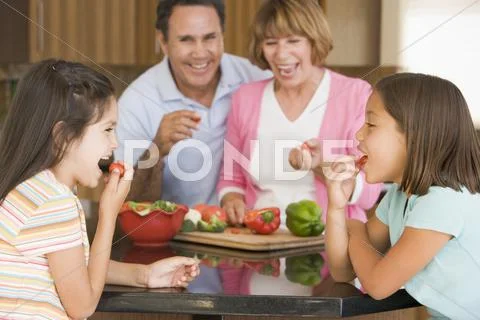 Family preparing meal,mealtime together Stock Photos