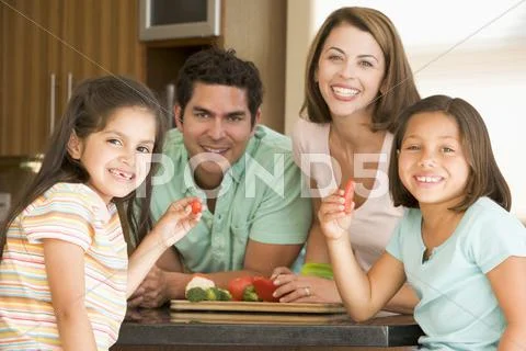 Family preparing meal,mealtime together Stock Photos