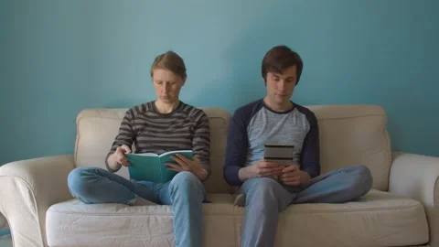 Family reading on the couch Stock Footage 130963148