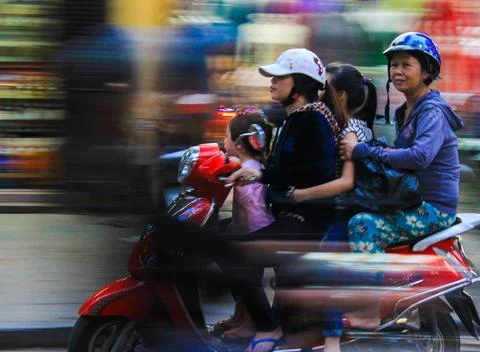 Family Riding on Scooter Vietnam Stock Photos