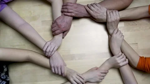 Family with stack of hands showing unity and closeness. Stock Footage 135360773