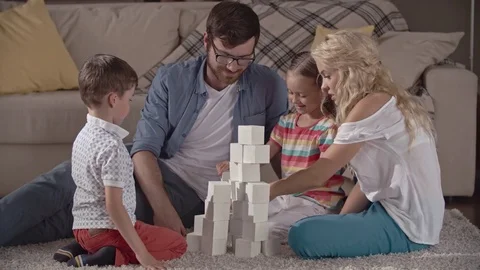 Family stacking bricks Stock Footage 71568514