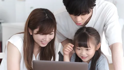 A Family Staring at a Computer Stock Footage 332751427