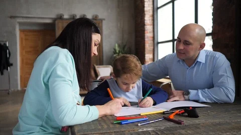 Family of three at the table Video stock 89218628