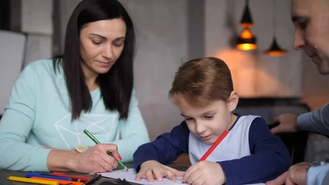 Family of three at the table Video stock 89218975