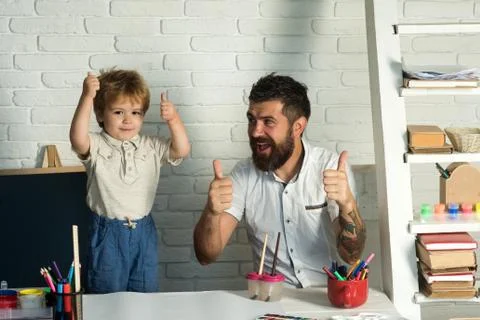 Family thumbs up. Father and little cute son show thumbs up Stock Photos