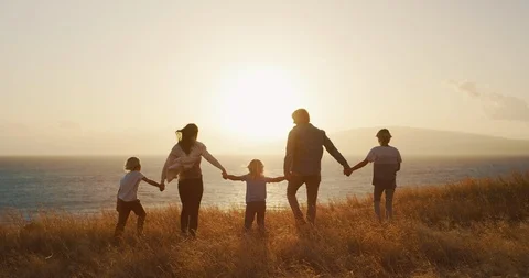 Family time at sunset Stock Footage 102872785