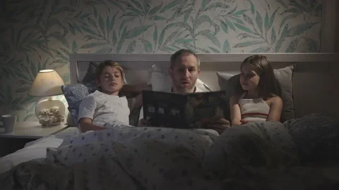 Family using laptop in bed. Stock Footage 162782811