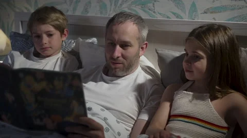 Family using laptop in bed. Stock Footage 163044170
