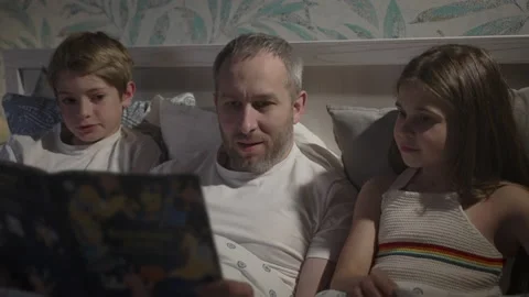 Family using laptop in bed. Stock Footage 164351981