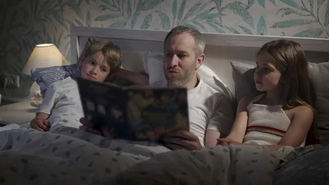 Family using laptop in bed. Stock Footage 164832783