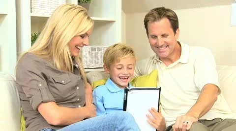 Family Using Online Web Chat Talking to Friends Stock Footage 8987039