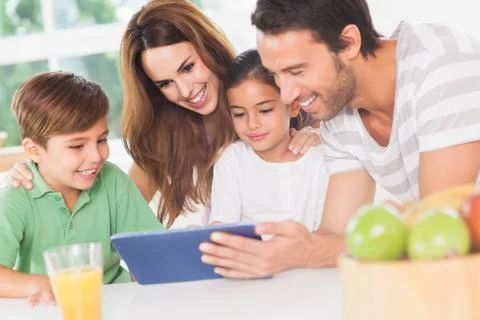 Family using a tablet pc Stock Photos