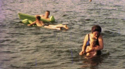 Family Vacation Beach Mother Holds Baby Boys 60s Vintage Film Home Movie 1277 Stock Footage