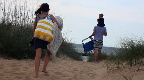 Family walking to beach Stock Footage 52996569