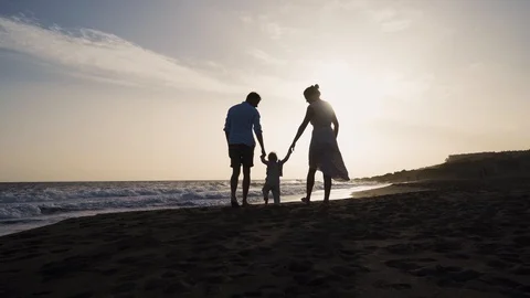 Family Walking Beach Sunset Travel Holiday Concept. Stock Footage