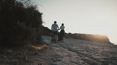 Family walking with stroller Stock Footage 63074899