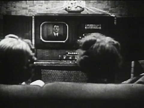 Family watching television 1946 archival footage Stock Footage