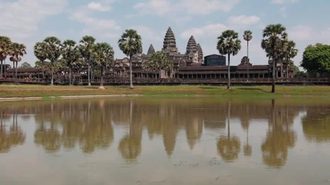 Famous angkor wat temple complex in cambodia reflecting in the lake. An ancient Stock Footage 325073156